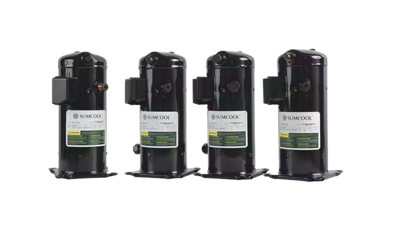 Four turbo compressors used in refrigeration systems, showcasing their compact design and advanced technology for quieter operation.