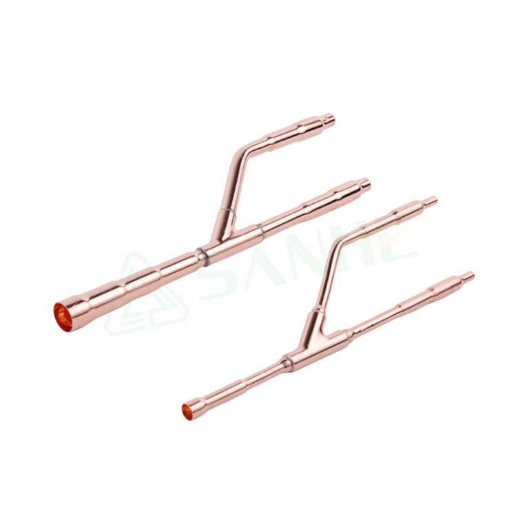 Two copper piping components with angled and straight sections, used in HVAC heating systems for efficient fluid flow and installation.