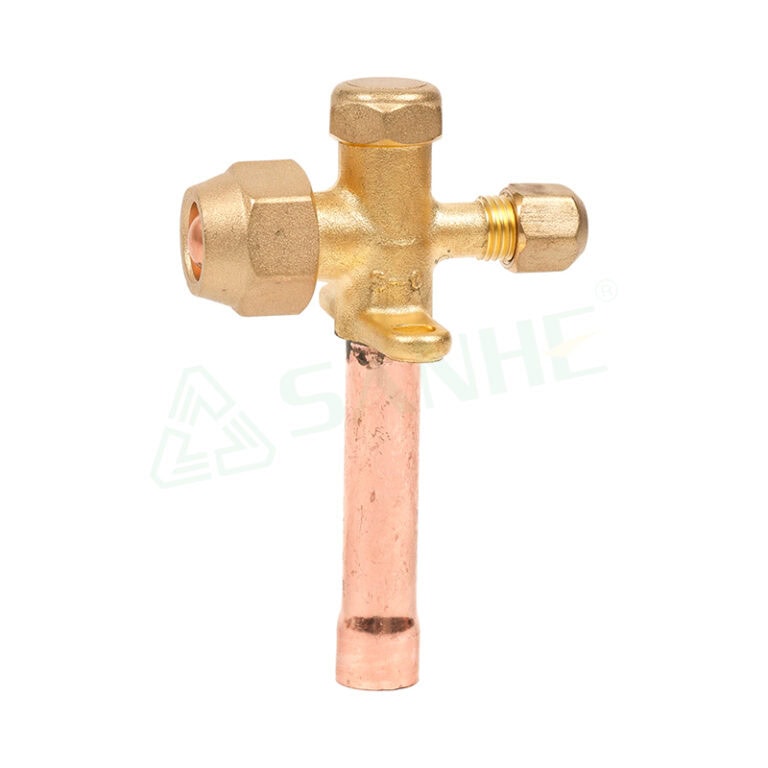 Close-up of a brass and copper HVAC refrigerant valve used in heating and cooling systems for optimal performance.