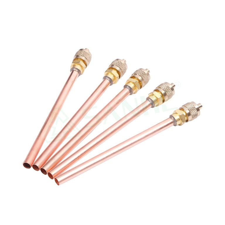 Set of five copper access valves with brass fittings for HVAC systems, used for refrigerant flow control and system maintenance.