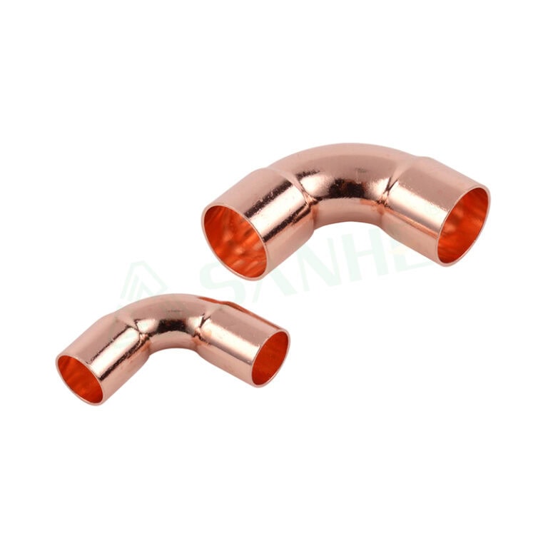 Two copper pipe elbow fittings used in HVAC systems, showcasing their smooth, shiny surface and precise bend for efficient piping connections.