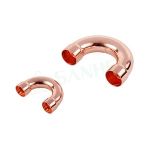 Two copper pipe elbows used in HVAC systems for efficient fluid flow and installation.