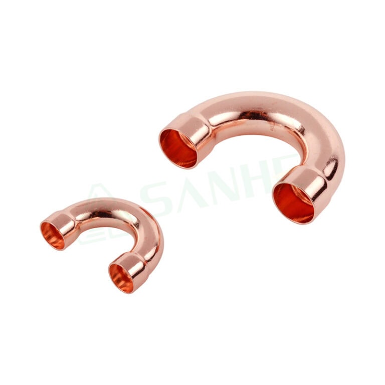 Two copper pipe elbows used in HVAC systems for efficient fluid flow and installation.