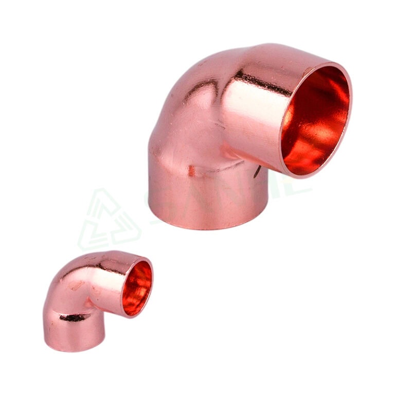 Close-up of a copper pipe elbow fitting used in HVAC and plumbing installations, showcasing its smooth, shiny surface and precise bend.